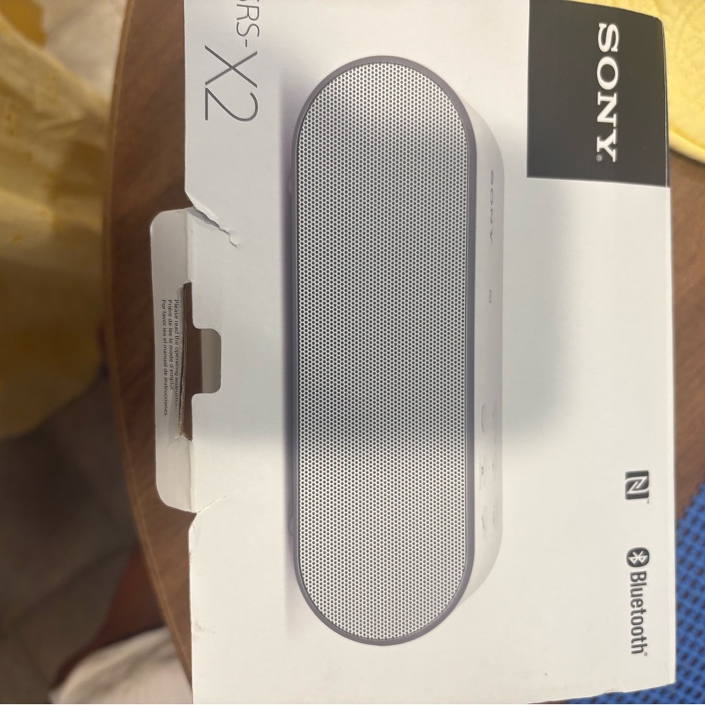 Sony Portable Bluetooth Speaker in white and silver